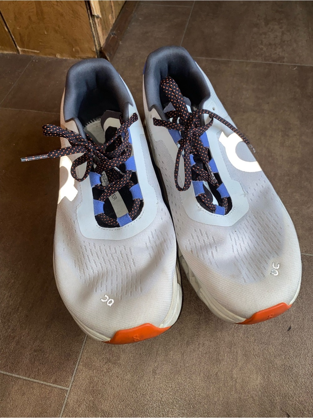 On Running Men’s Athletic Shoes — Light Gray with Blue and Orange Accents